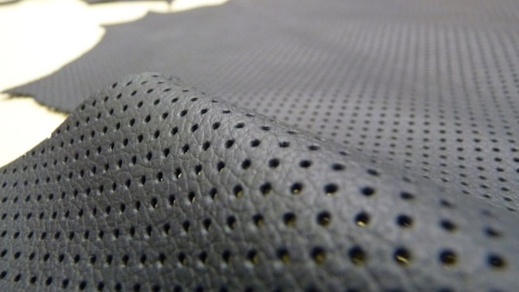 black perforated leather - through holes