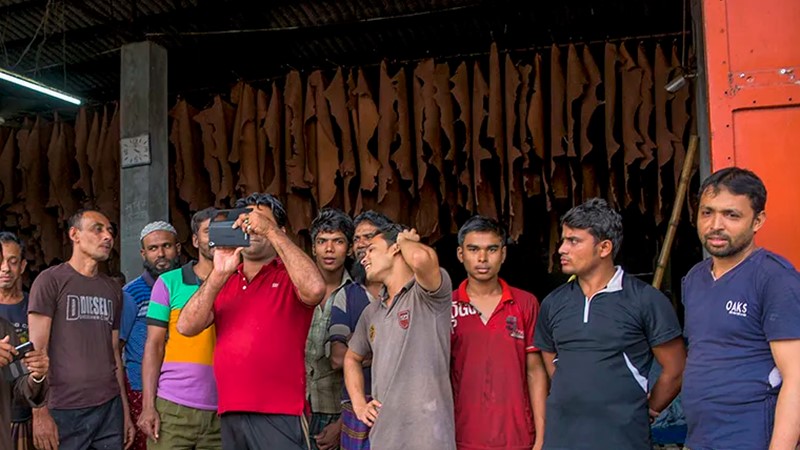 group photo of tannery workers